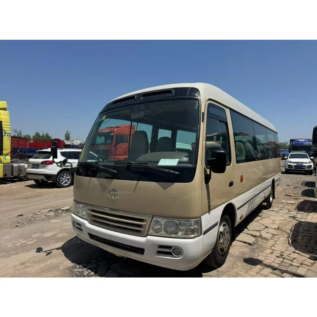 imgi_18_High-Spec-Diesel-Toyota-Coaster-23-Passenger-Van Toyota Coaster 23 Passenger Van - Image 1